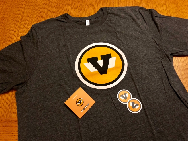 T-Shirt, pin, and stickers with Vector logo